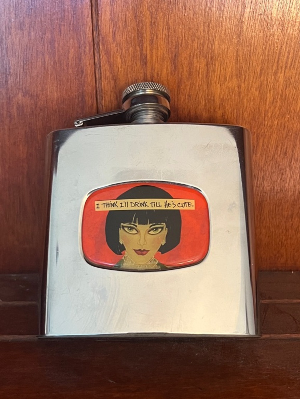 Stainless Steel Hip Flask with secure screw top lid.